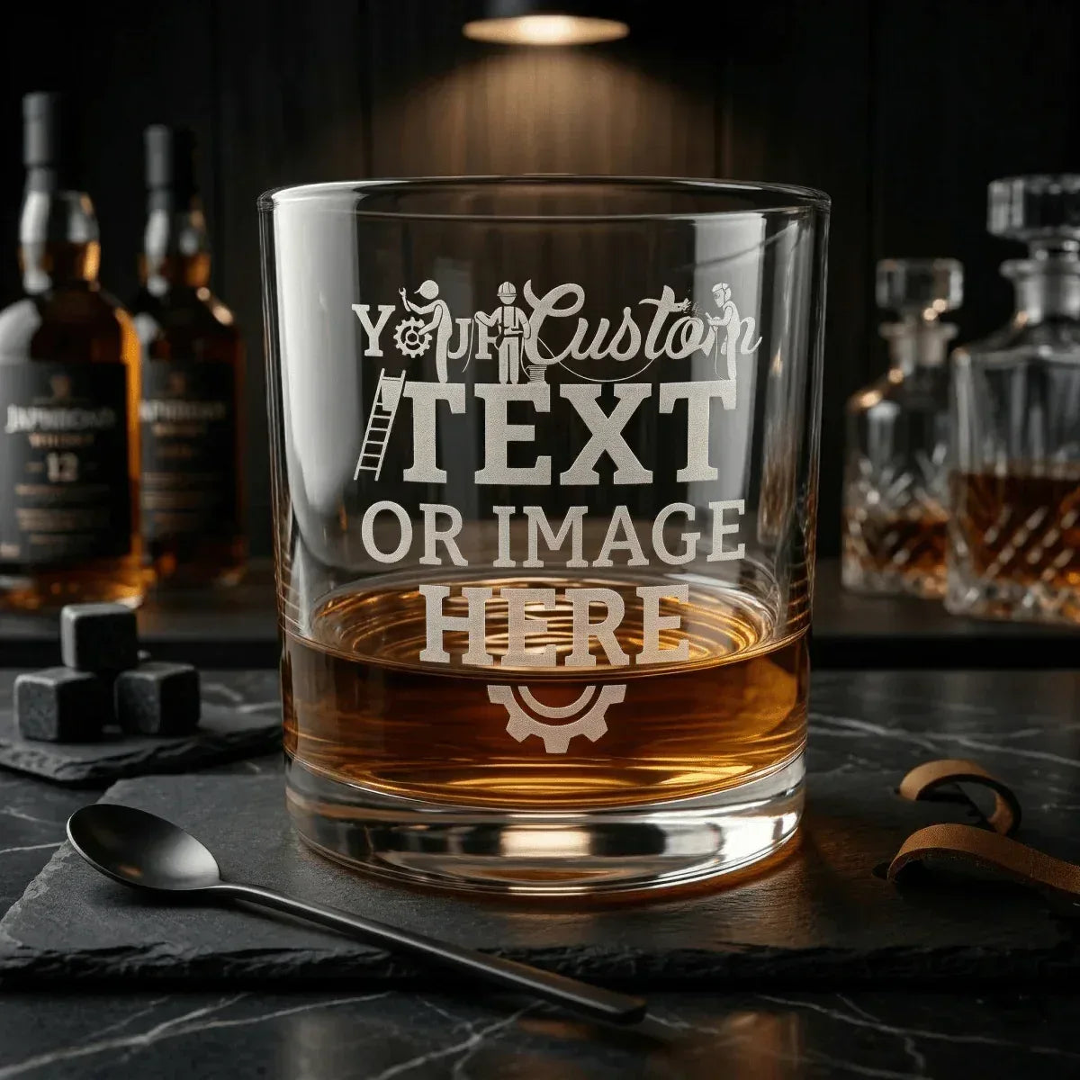 Personalized engraved rocks glass filled with whiskey and custom text engraving. Premium laser engraved whiskey glass.