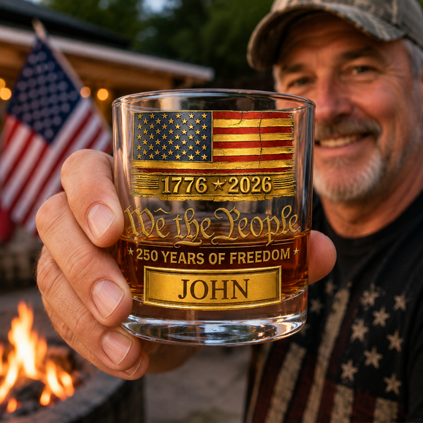 Personalized America 250th Anniversary whiskey glass featuring We The People artwork, American flag, 1776-2026 design, 250 Years of Freedom message and custom name personalization.