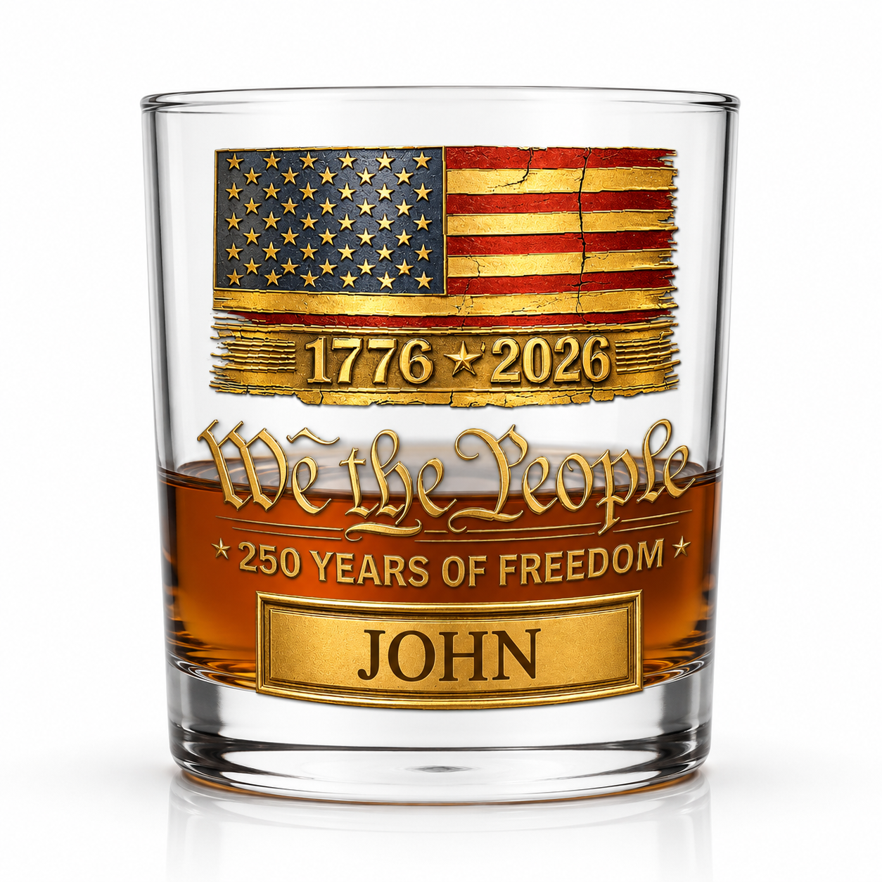 Close-up of a personalized We The People whiskey glass featuring American flag artwork, custom name engraving, and America 250th Anniversary design.